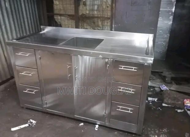 Unique Modern Stainless Cabinet With a Sink