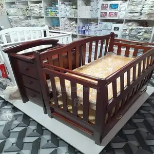 Compact Wooden Baby Crib – Space-Saving Stylish