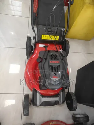 Lawnmower Machine Petrol Powered .