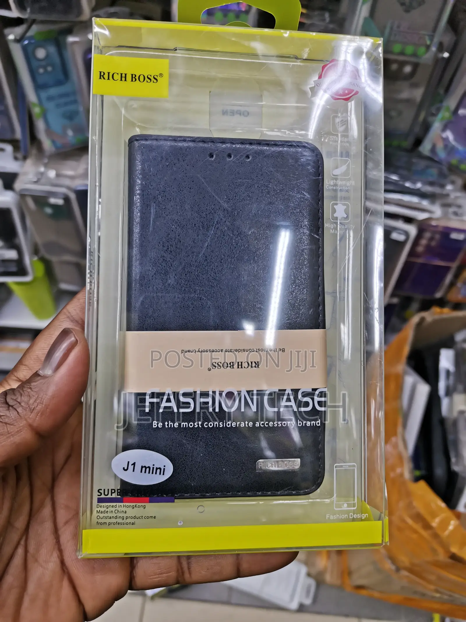 Universal Richboss Flip Cover for Samsung J1 Mini -Black
