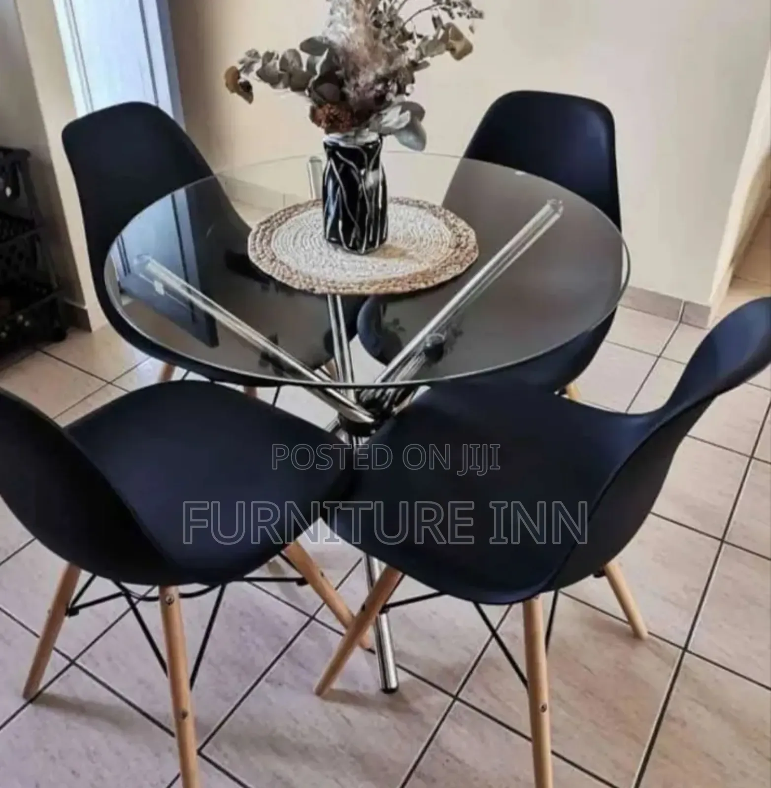 Round Glass Table + 4 Eames Chairs