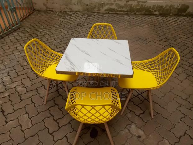 White Table and Yellow Dinning Chairs - thumbnail 2