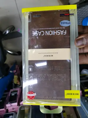 Universal Richboss Leather Flip Cover for Oppo Reno6 - Brown
