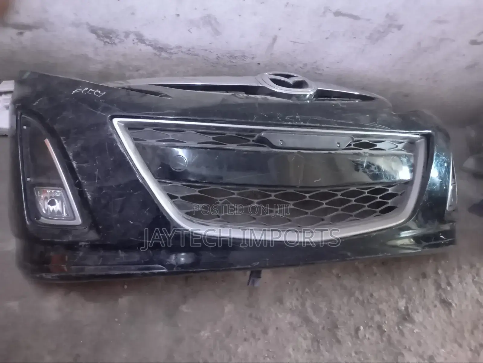 Mazda Biante Front Bumper
