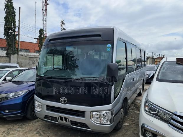 Toyota Coaster 2018 Grey - thumbnail 2