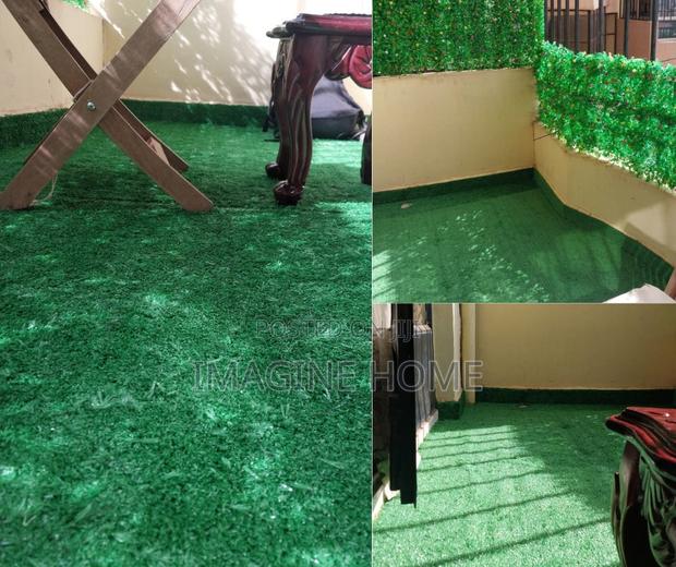 Artificial Green Grass Carpet and the Wall Hedges