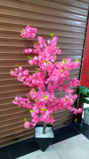 Pink Blossom Plant With Vase