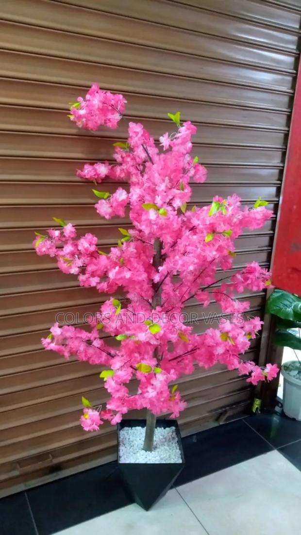 Pink Blossom Plant With Vase