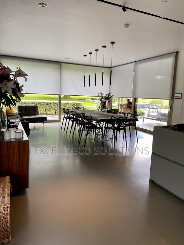 Natural Colour Sunscreen Roller Blinds - main view