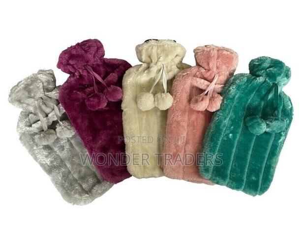 Hot Water Bottle With Fleece Cover.Capacity 2 Litres