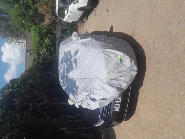 Double-Layered Car Cover – Universal Fit for Full Weather Pr
