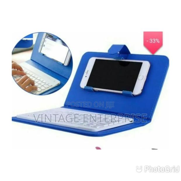 Multifunctional Bluetooth Keyboard and Leather Case Pouch - thumbnail 2