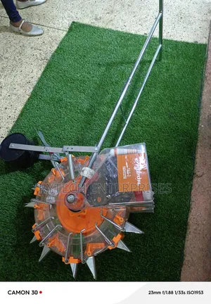 Seed Planter With Seed and Fertilizer Pocket