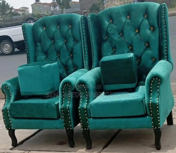 Salon King Size Chairs Are Green in Colour With 2 Poufs.