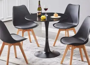 Round Dining Table With Four Padded Dining Chairs