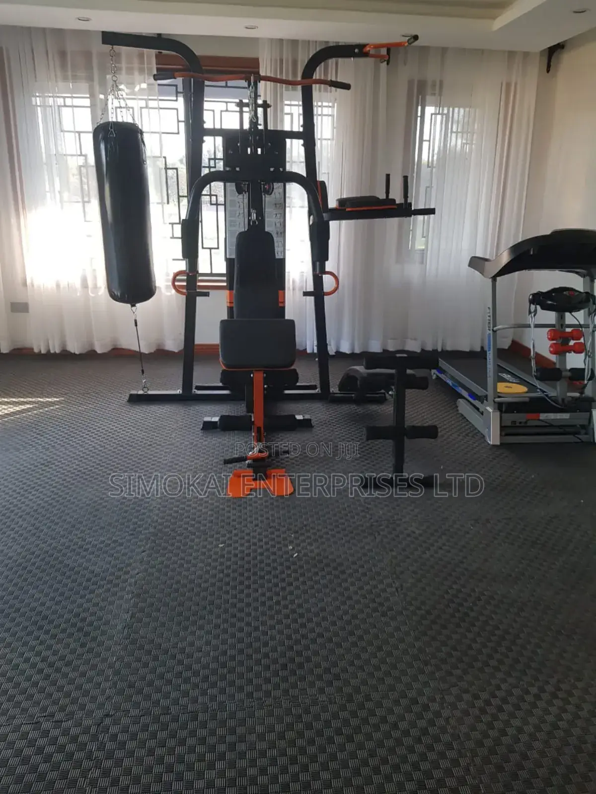 Multipurpose Gym Station With a Punching Bag