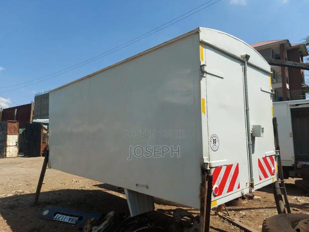 Closed Isuzu NKR Body 2012 White