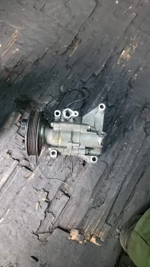 Mazda Demio Compressor.
