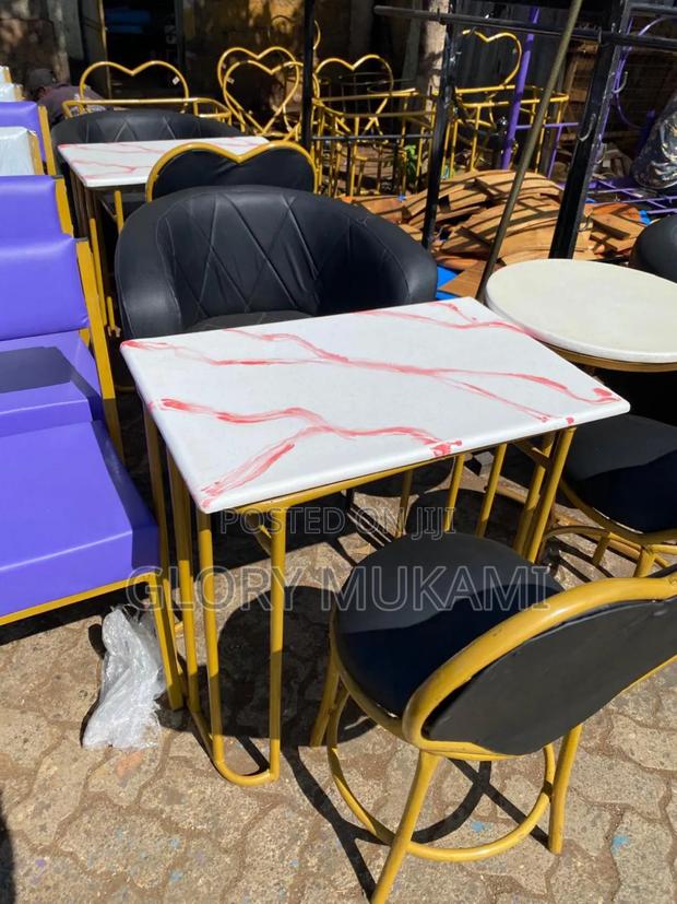 Black Set Manicure Chairs and Marble Manicure Table