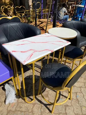 Black Set Manicure Chairs and Marble Manicure Table