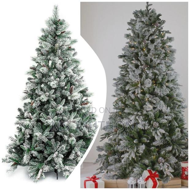 2000 Leaves Premium Pine Snow Flocked Xmas Tree With Cone - main view