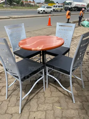 Brown Round Table and Restaurant and Bar Chairs