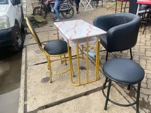 Black Manicure Chairs and Manicure Marble Pink Table