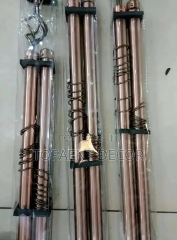 Brown Adjustable Curtain Rods With Curtain Rings