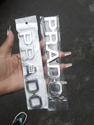 Chrome Prado Lettering Badge