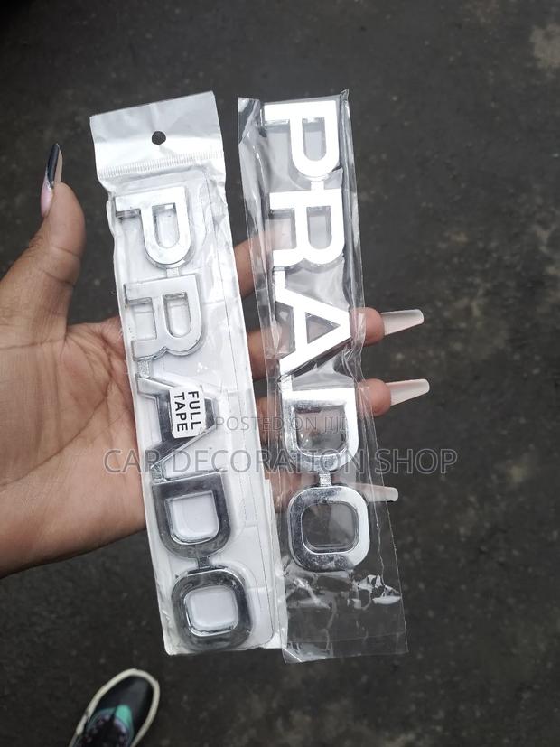 Chrome Prado Lettering Badge