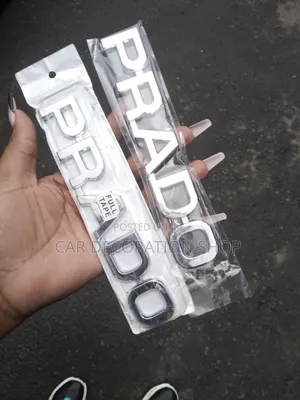 Chrome Prado Lettering Badge