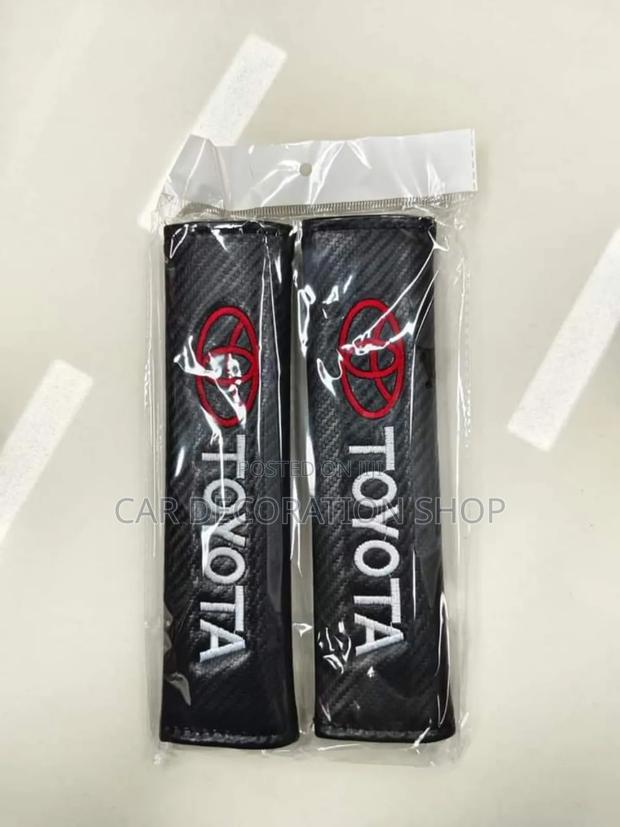 2pc Neck Toyota Pillow Carbon Finish Safety Belt Pad - main view