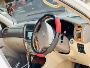 Car Fitted With Black Red Soft Spongantislip Steering Cover