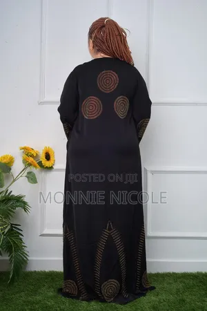 Trendy Abaya/Kaftan. Black Gold