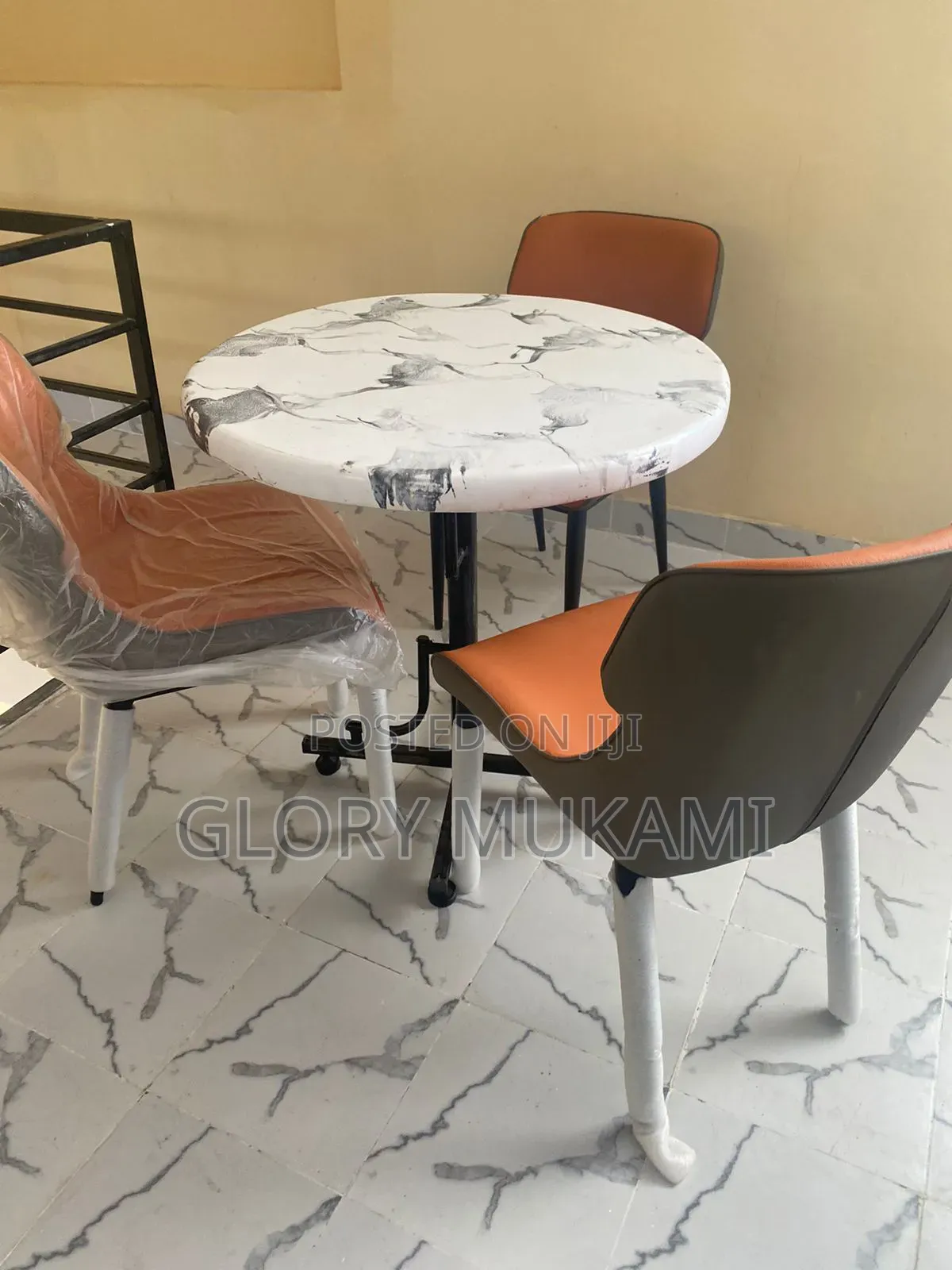 Restaurants Chairs and Round Marble Table