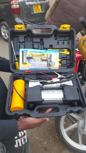 Tire Inflator Pump With Puncture Mending Kit