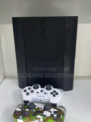 Sony Ps3 + ,Camouflage Pad , 15 Games