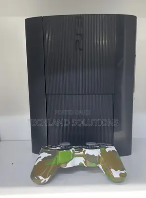 Sony Ps3 + ,Camouflage Pad , 15 Games