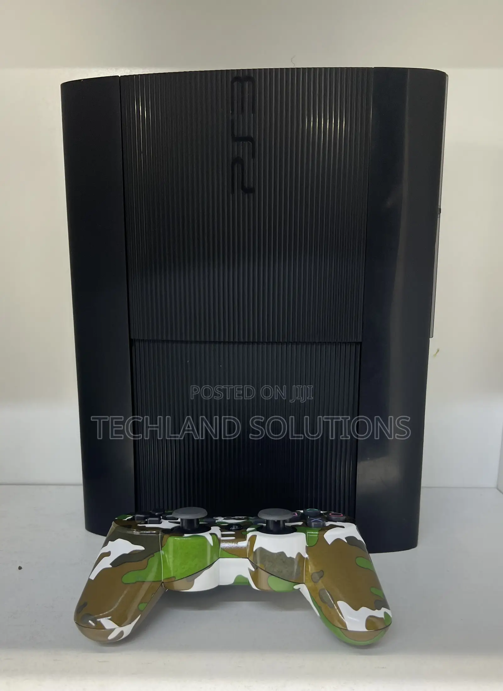 Sony Ps3 + ,Camouflage Pad , 15 Games