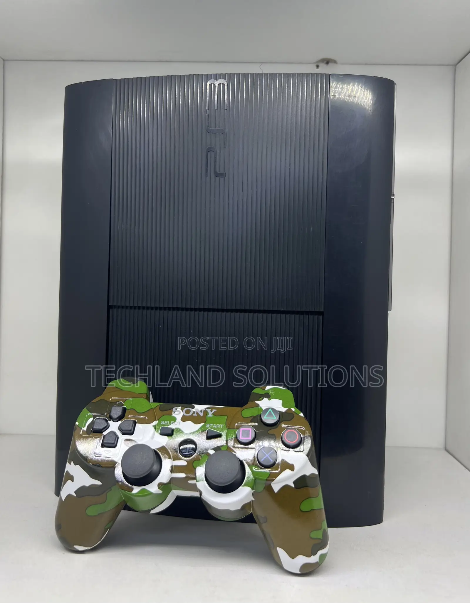 Sony Ps3 + ,Camouflage Pad , 15 Games
