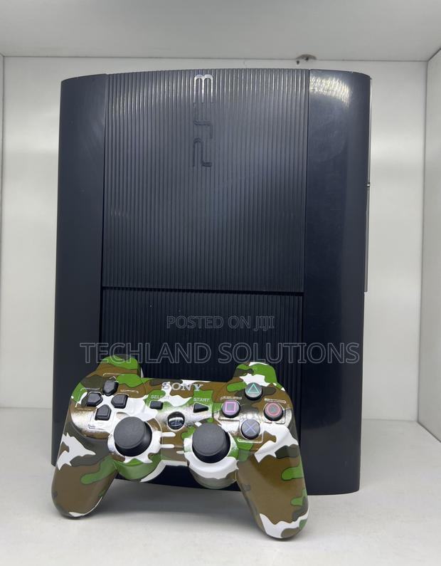 Sony Ps3 + ,Camouflage Pad , 15 Games - main view