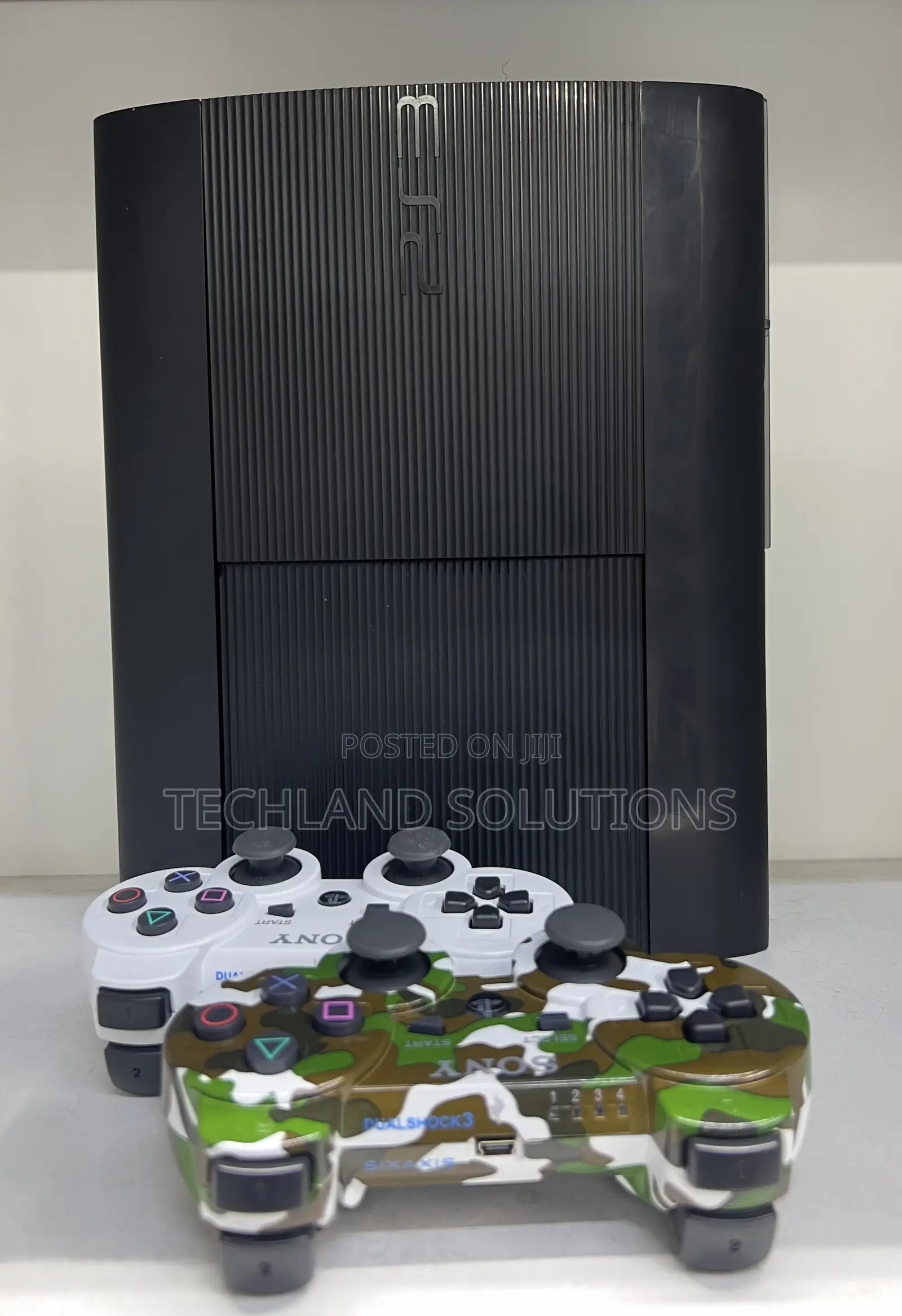 Sony Ps3 + ,Camouflage Pad , 15 Games