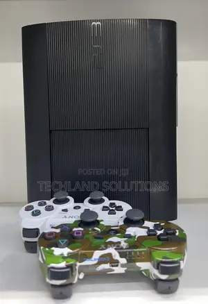 Sony Ps3 + ,Camouflage Pad , 15 Games