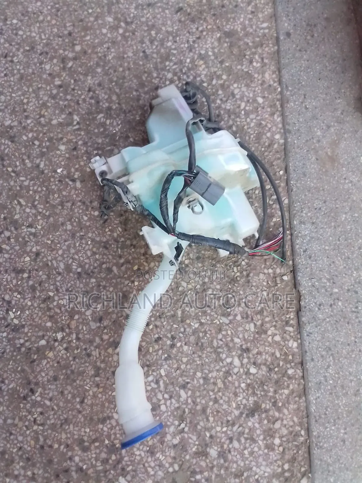 Mazda Demio Washer Bottle