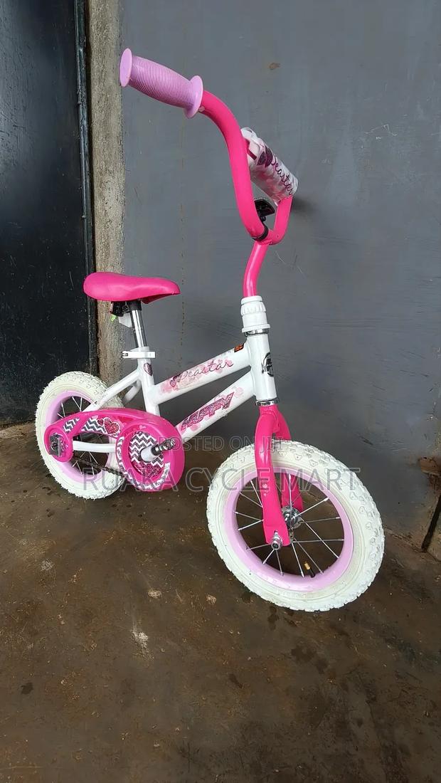 Pink and White Size 12 Ex USA Bike