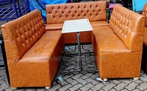 Comfy Restaurant Set of Couches and a Table.