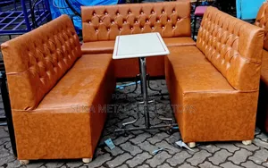 Comfy Restaurant Set of Couches and a Table.