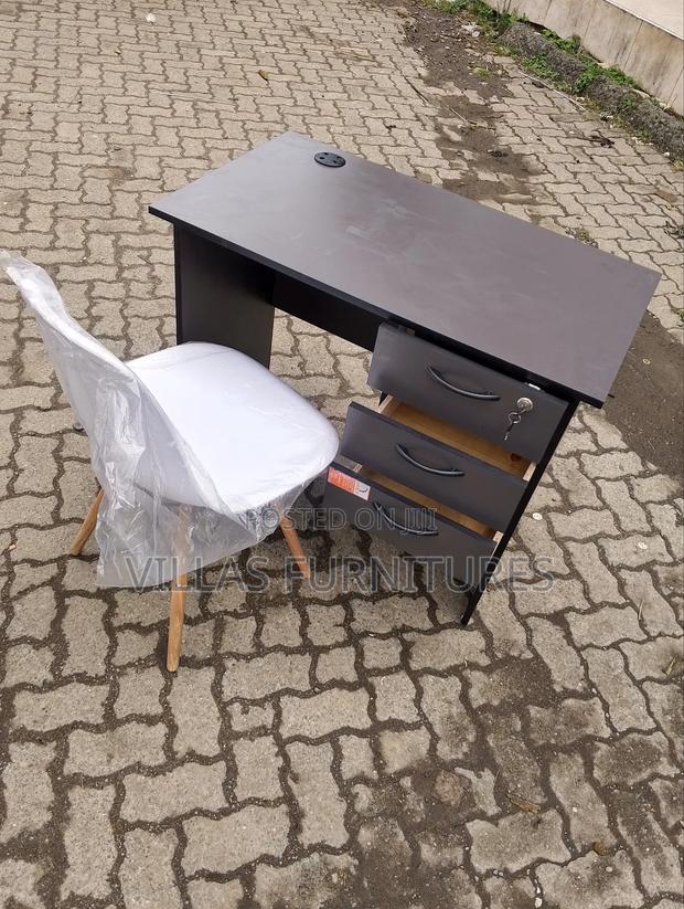 White Eames Chair and 0.9 Study Table