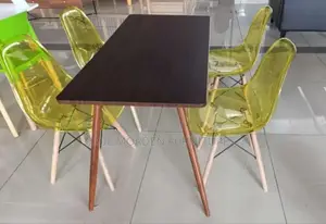 Rectangular Brown Dining Table With Four Dining Chairs