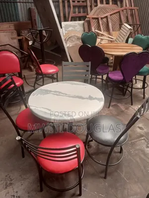 Colourful 3 Seats and a Marble Top Quality Table